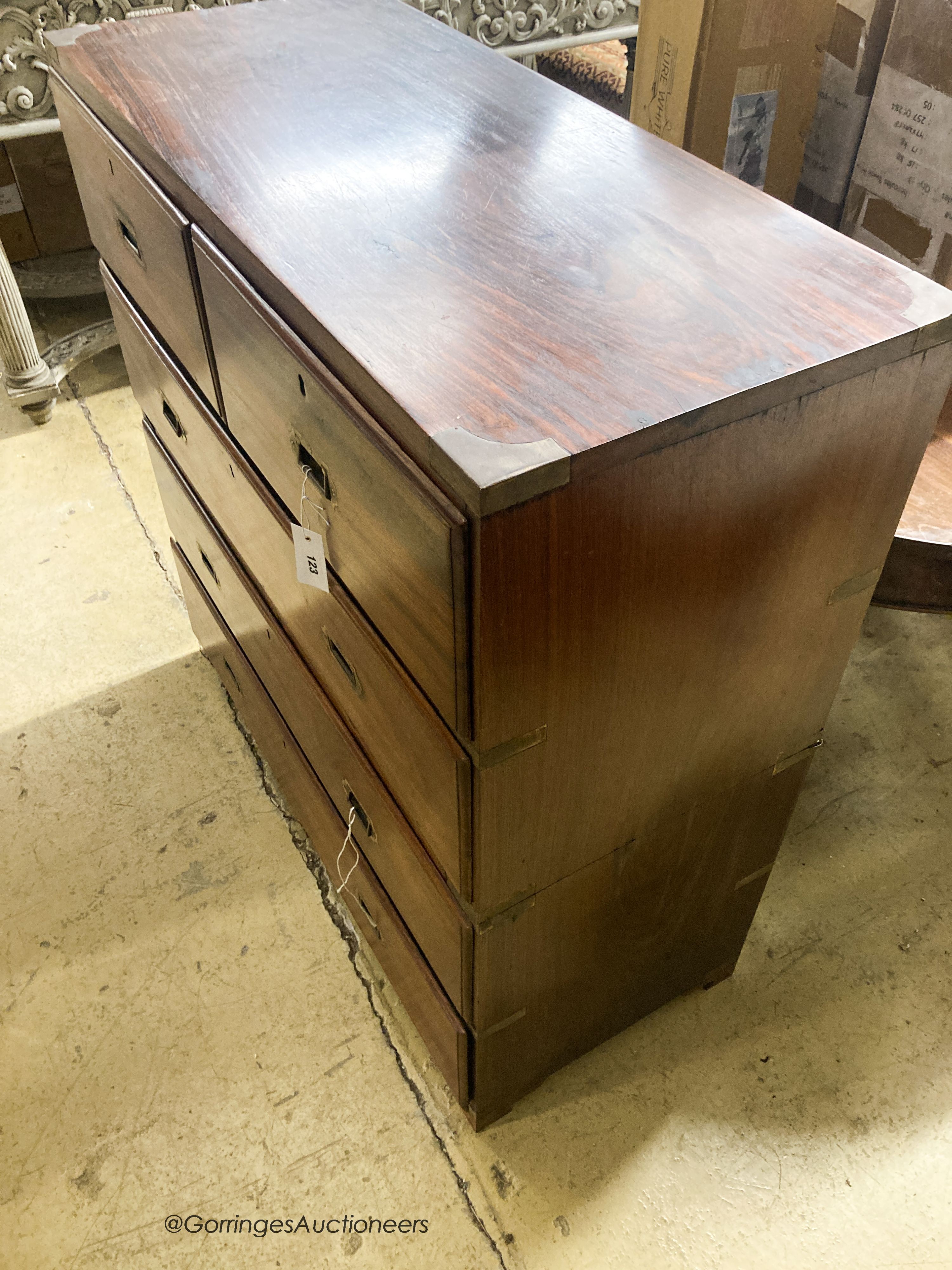 An early 20th century Anglo Indian rosewood two part military chest with brass inset handles, width 103cm, depth 44cm, height 107cm